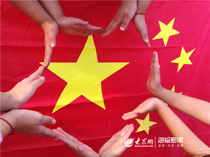 鲁能希望小学开展"我与国旗合个影,我对祖国说句话"主题教育活动
